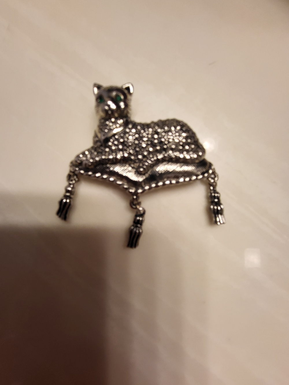Silver Cat Brooch with Green Eyes On Pillow With Hanging Tassels